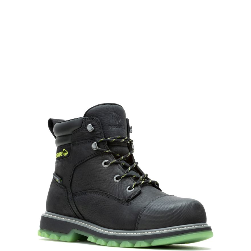 a black boot with green accents