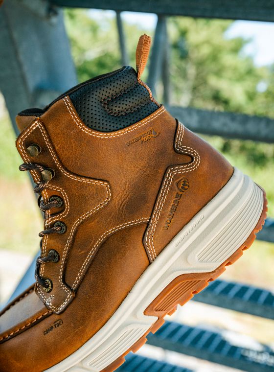 A tan Wolverine brand work boot