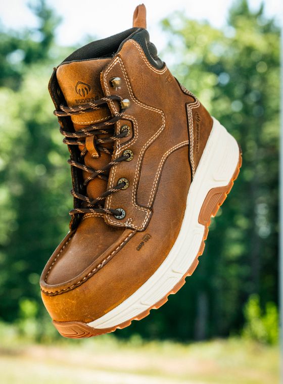 A tan Wolverine brand work boot