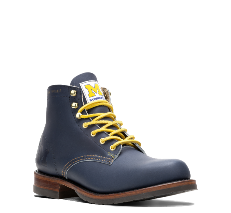 a blue leather boot with yellow laces and the Michigan block M on the tongue