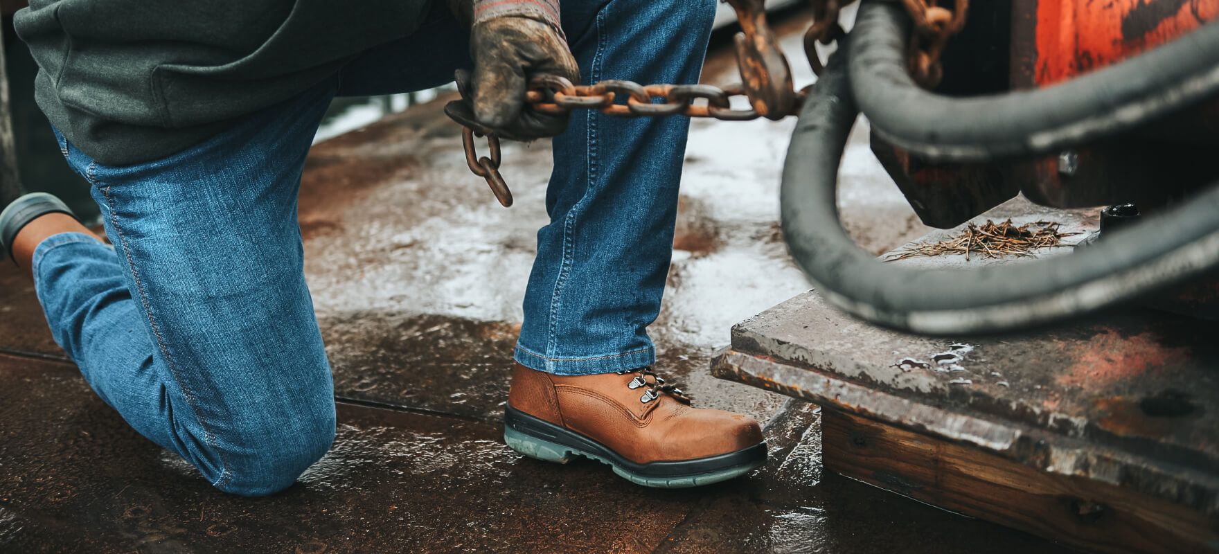 a person cutting a concrete slab